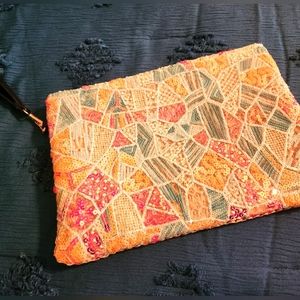 Beaded wristlet clutch